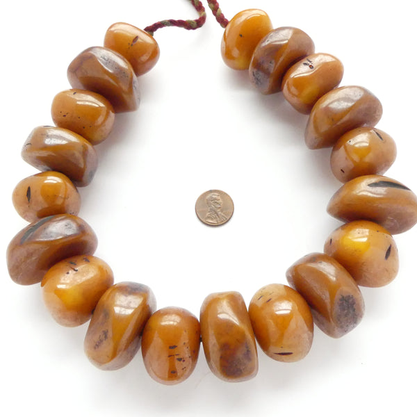Tibetan Faux Amber Strand of 19 Beads About 25x30mm