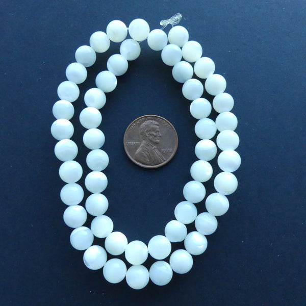 Shell, Mother of Pearl White Rounds 7mm on 16" Strand