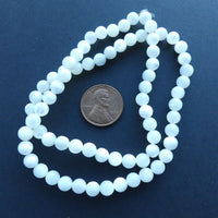 Shell, Mother of Pearl White Rounds, 4mm on 16" Strand