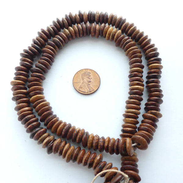 Wood Rondelles, Natural Brown, 3x10mm, 21" Strand (or equivalent bagged)