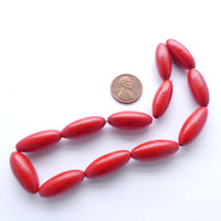 Wood Oval Painted Red, 25x10mm, 12" Strand
